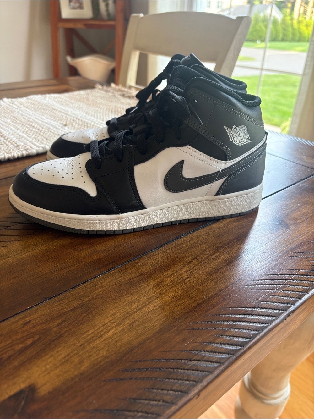 Nike Air Jordan Kids Black and White Mid-Top Sneakers